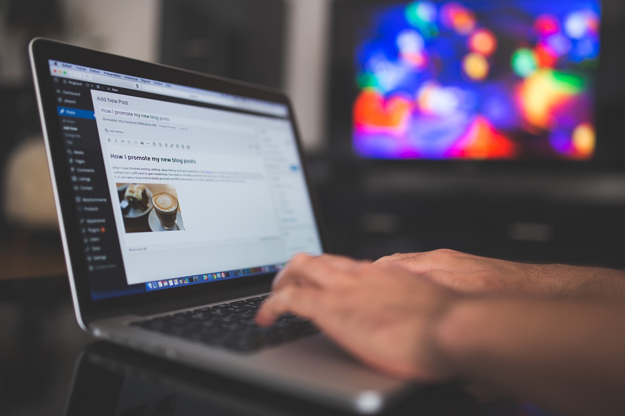 Small business owner reviewing a professional website on a computer screen